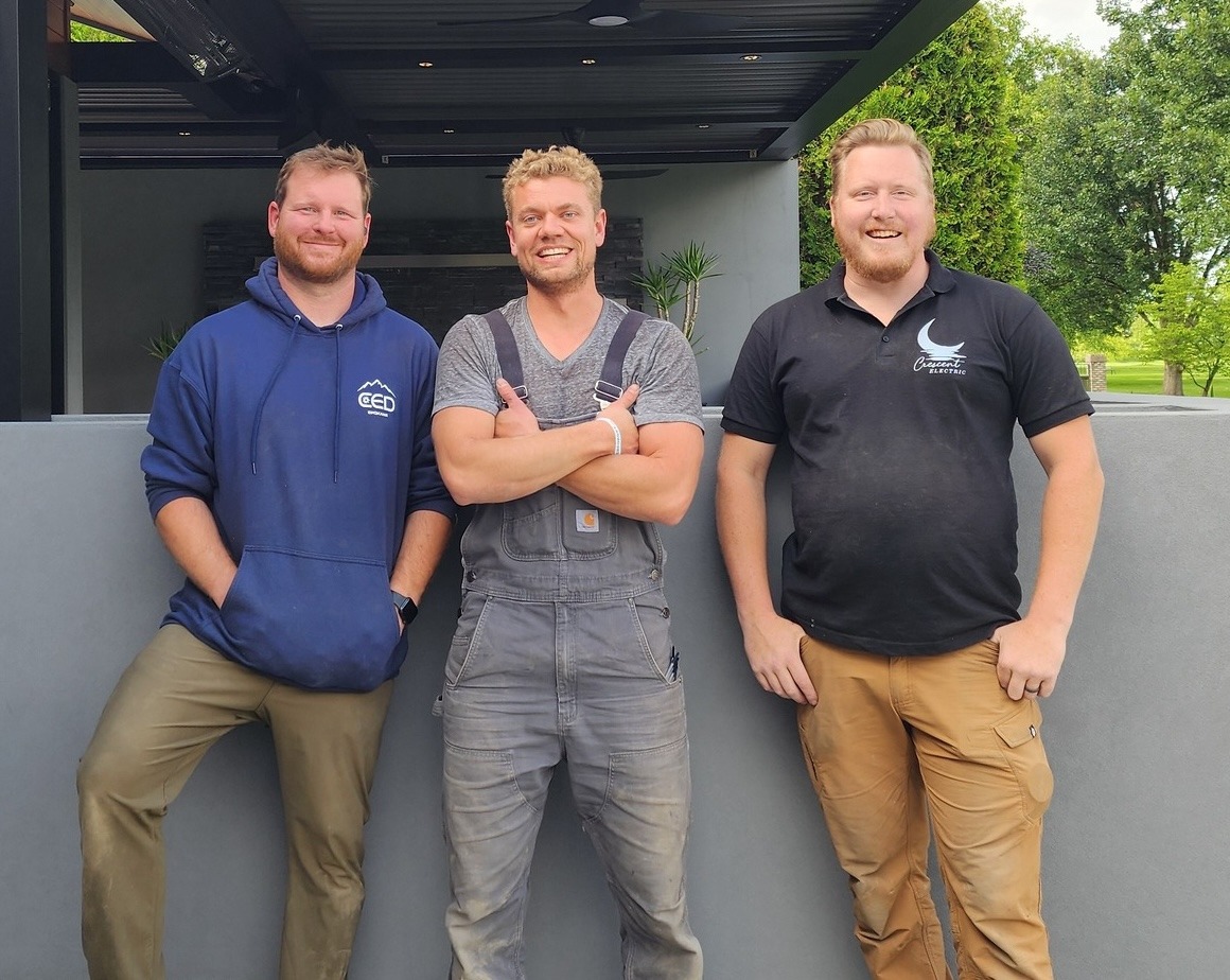 The Crescent Electric team in front of a finished home on the Palouse